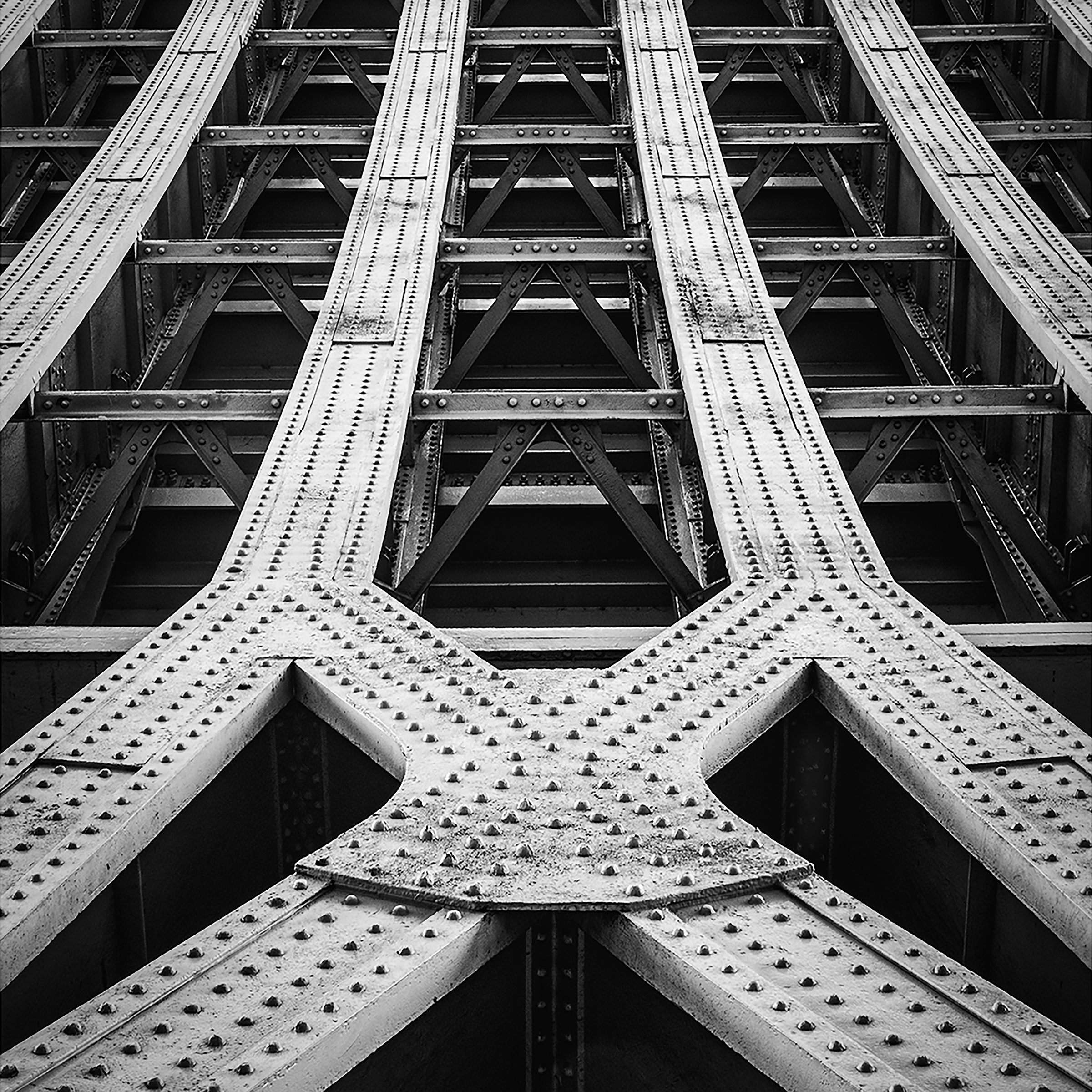 What Lies Beneath — repeating engineered forms and structural geometry