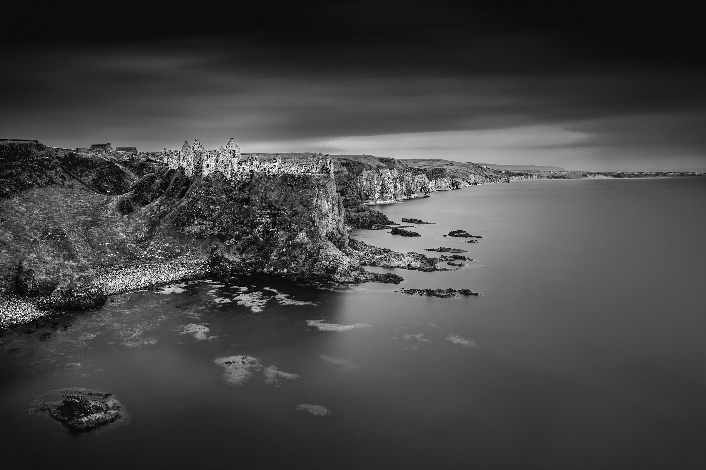 Dunluce Castle — the historic ruins positioned above the dramatic north coast