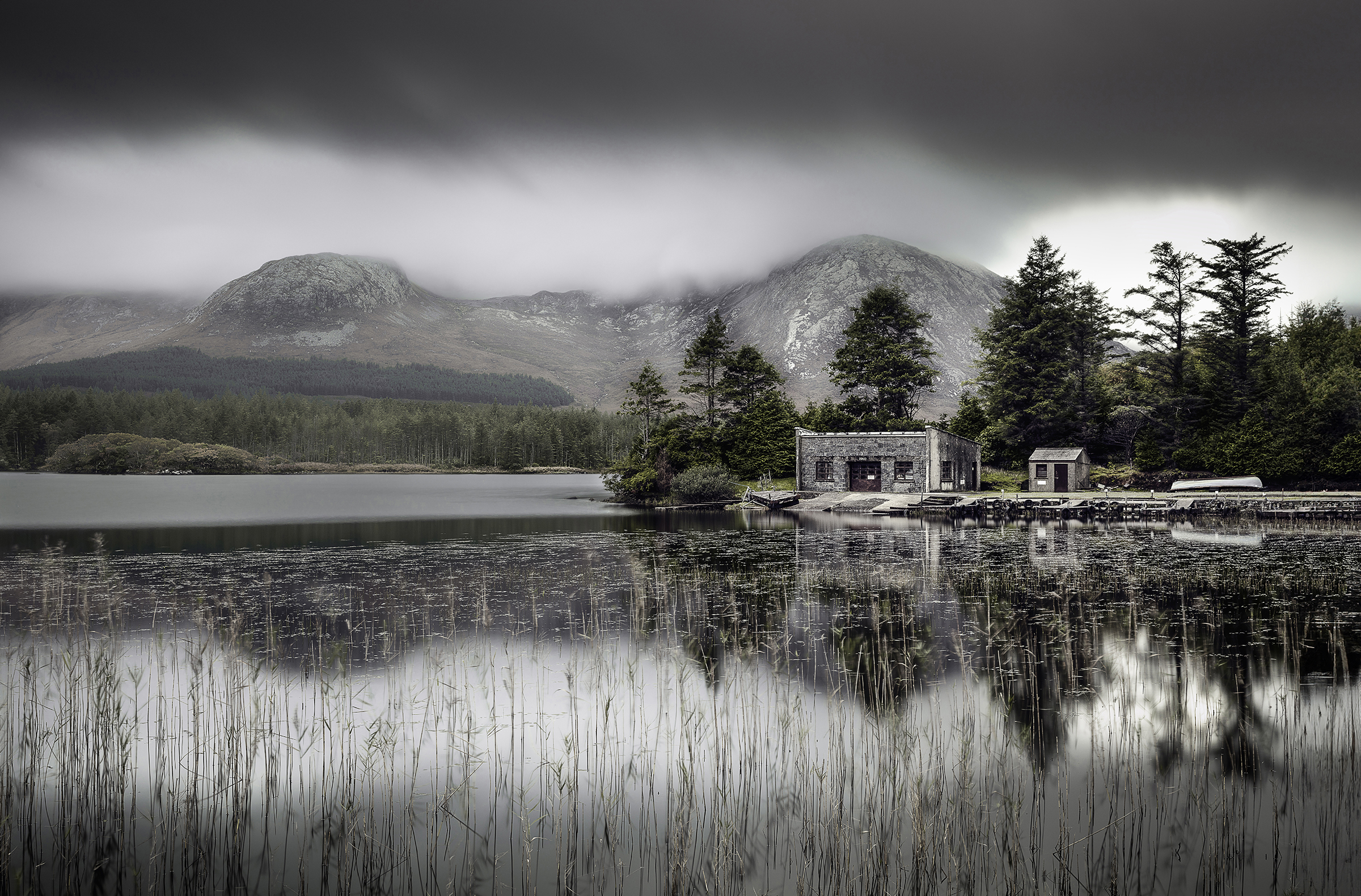 Inagh Valley — a quiet Connemara landscape of water, boathouse and mountains