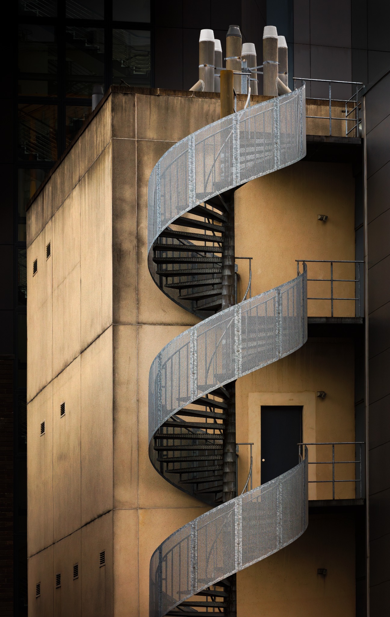 Spiral Staircase — architectural study of repeating curves and industrial geometry